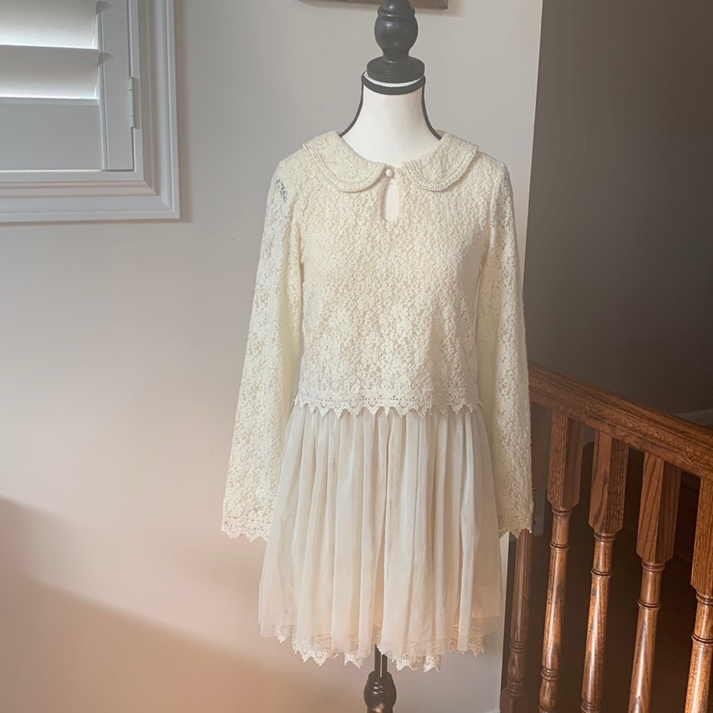 Luxurious layered lace mini dress with buttoned removable collar. Very ethereal.